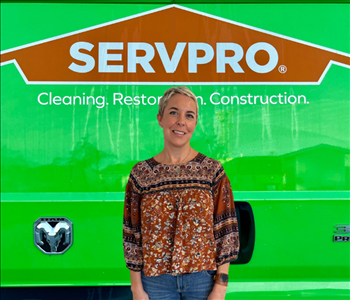 tech in front of Servpro van