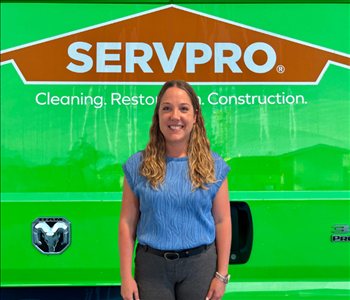 tech in front of Servpro van