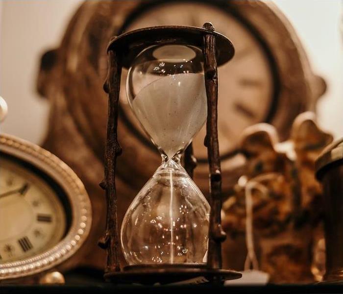 Antique time pieces (hourglass and antique clocks)